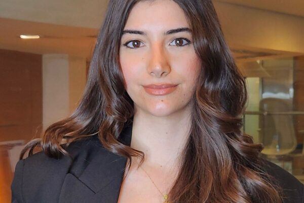 diana abouljoud clinical psychologist Clinical psychologist specializing in cognitive behavioral therapy (CBT) sitting in a modern therapy office, guiding a client through CBT techniques with notes and diagrams in the background; mental health counseling session focused on thoughts, emotions, and behavior